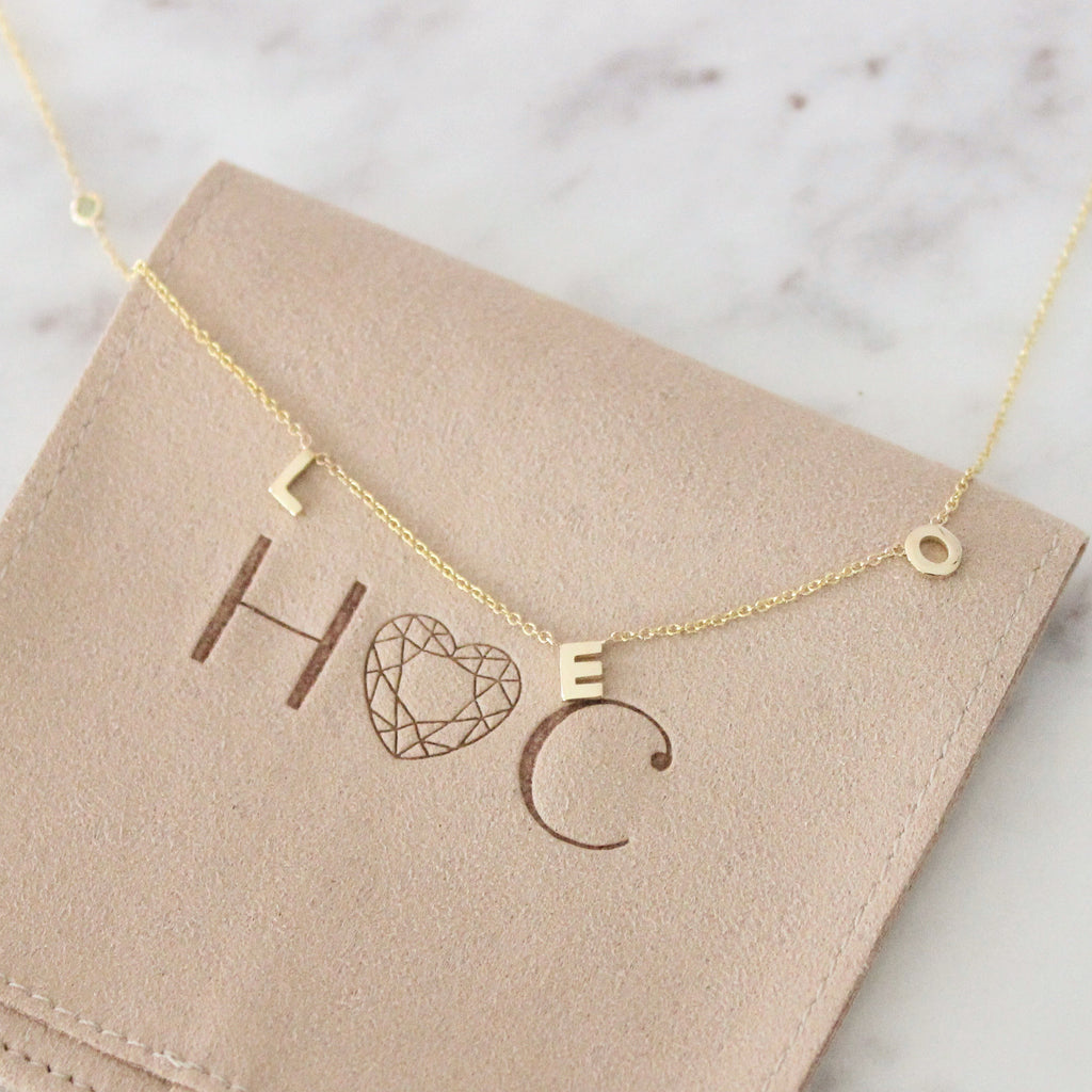 The Name Necklace can hold up to 5 of your favorite letters. Shop them here.