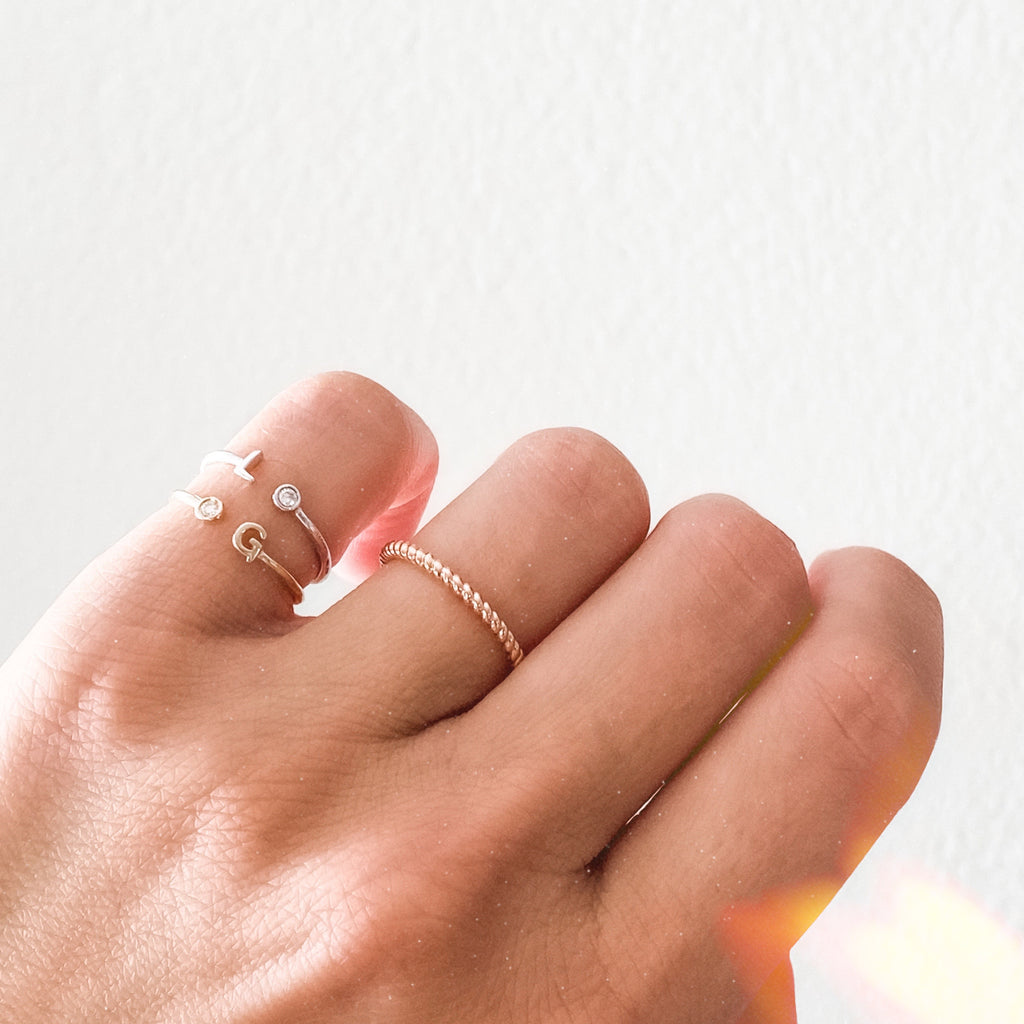 14K Initial Rings are personal and minimal. Wear your favorite letter and and birthstone. 