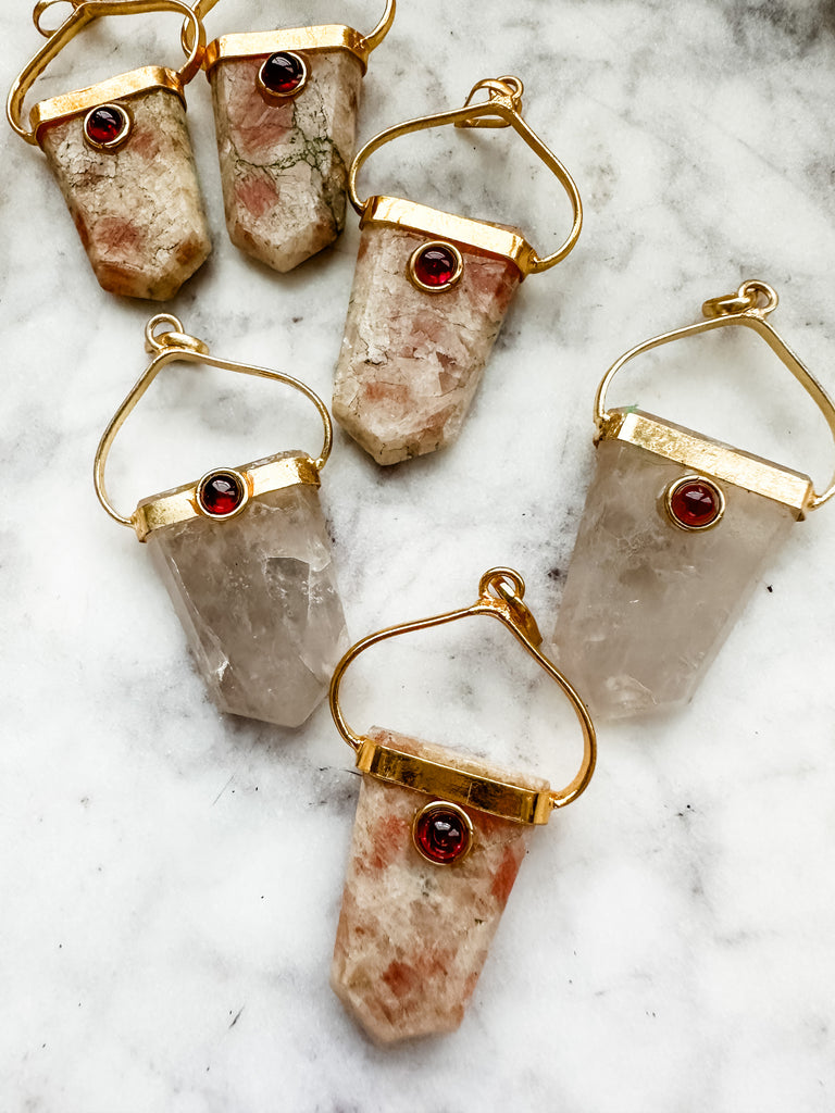 Gold Plated Shield Pendants with Garnet Accents