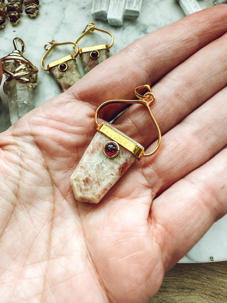 Gold Plated Shield Pendants with Garnet Accents