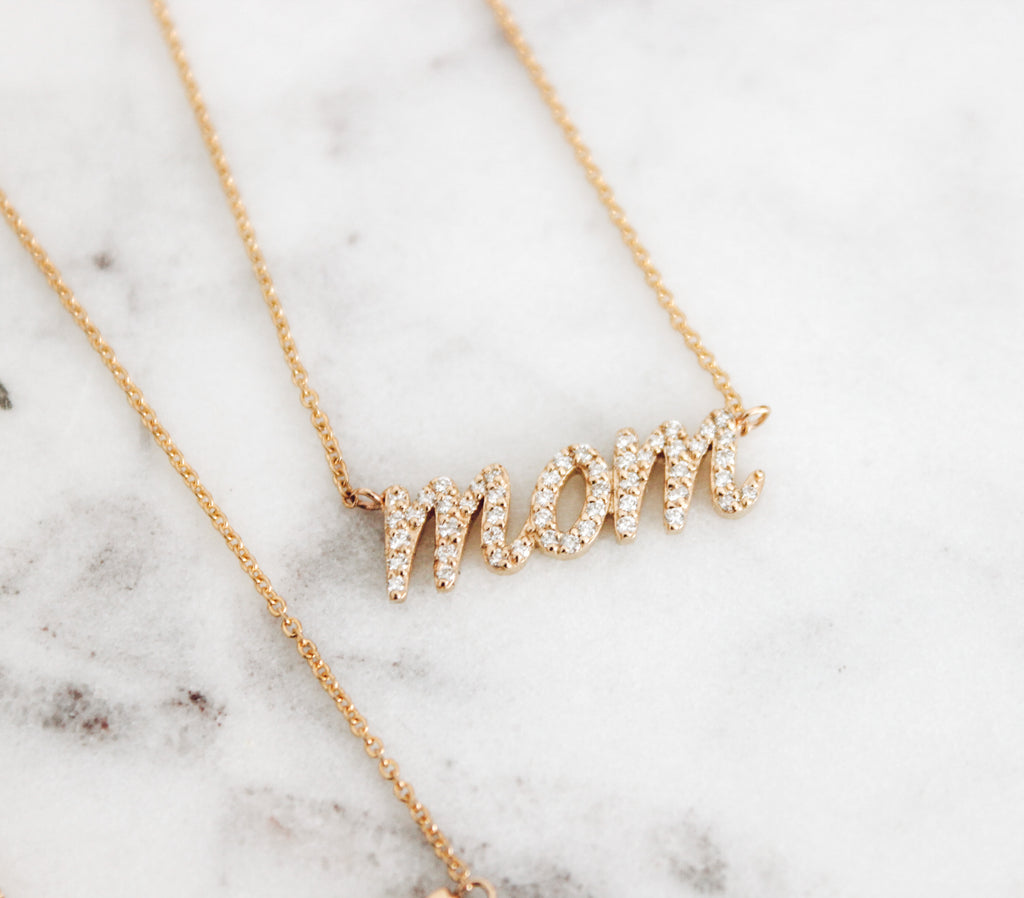 Pictured here is the cursive mom necklace with diamonds. 