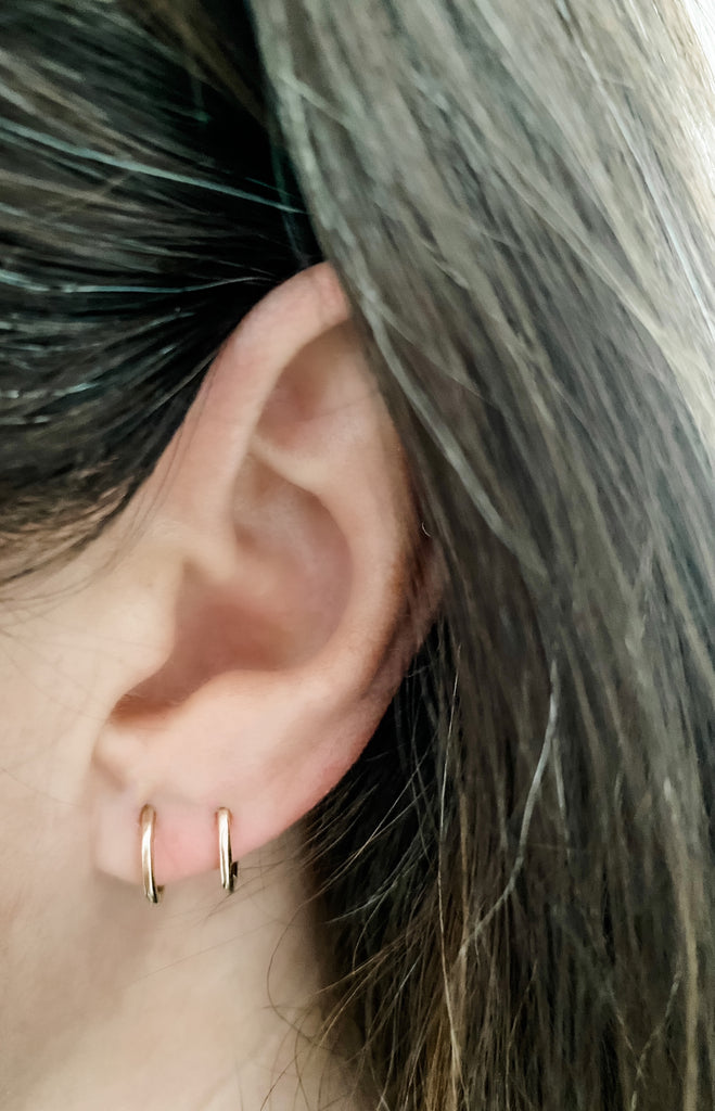 Wear them together next to each other if you have multiple piercings.
