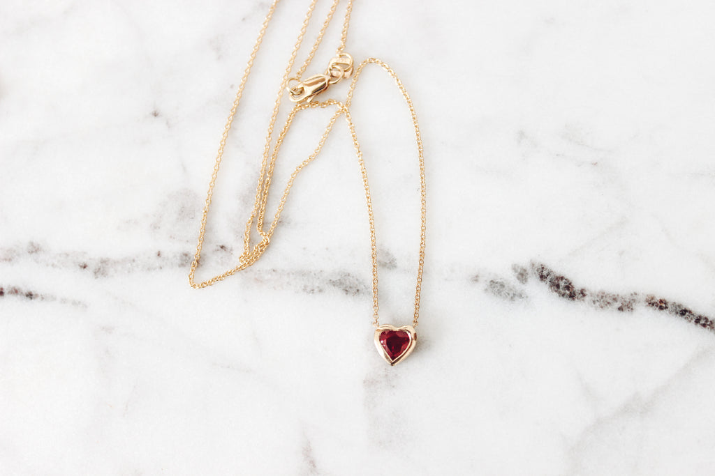 So pretty and minimal. A nice way to wear a heart with a bit of sparkle. 